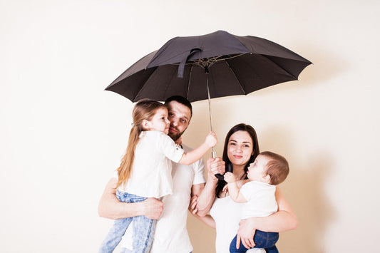 family with umbrella