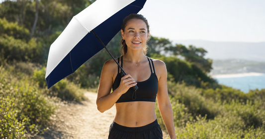 UV-Blocker compact personal sun umbrella in use outdoors — Sun Protection for Runners in 2026