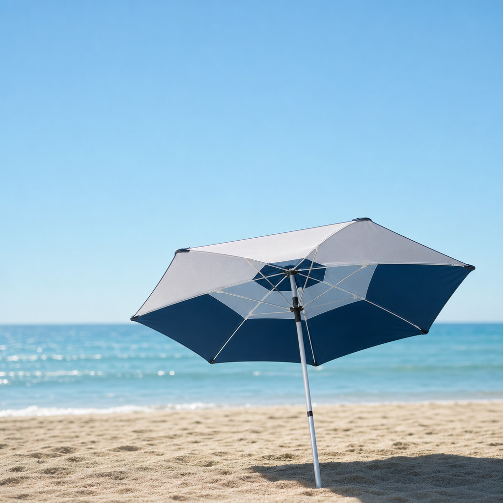 UV-Blocker large beach umbrella anchored in sand